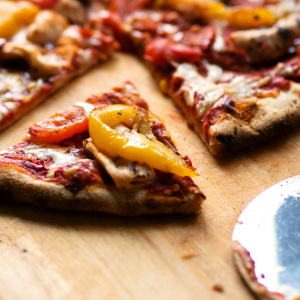 Indulge in a homemade pizza, made with golden, crispy crust, the rich, bubbling cheese and the aroma of fresh herbs.
