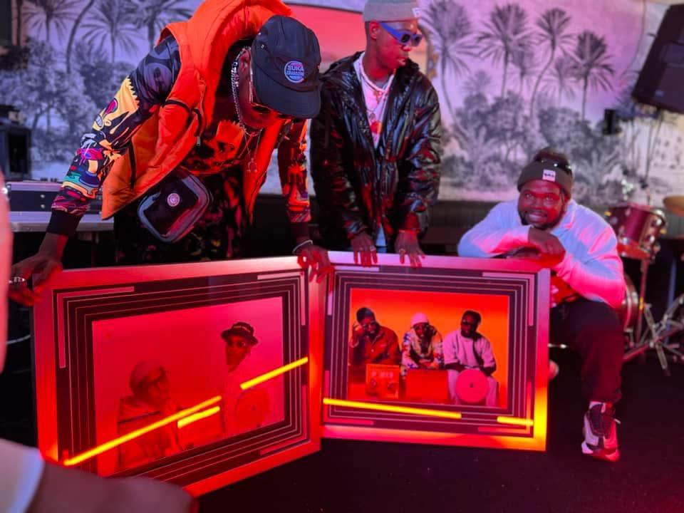 Musicians whose music was produced by Shayzar, Q-Mark, TpZee, Slick, and Afrikan Papi getting a plaque for their song 'Paris'. Picture: Supplied