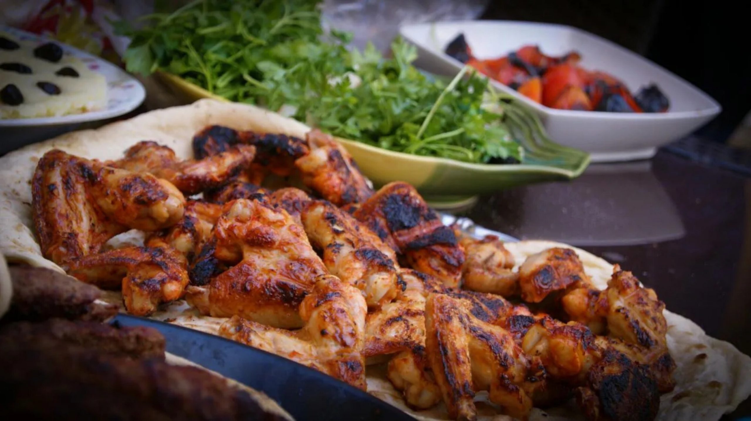 Sticky chicken wings recipe with crispy potato wedges, cooked to perfection.