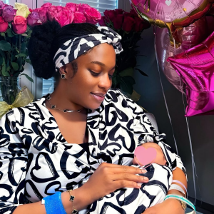 Actress Chika Ike and her newborn daughter