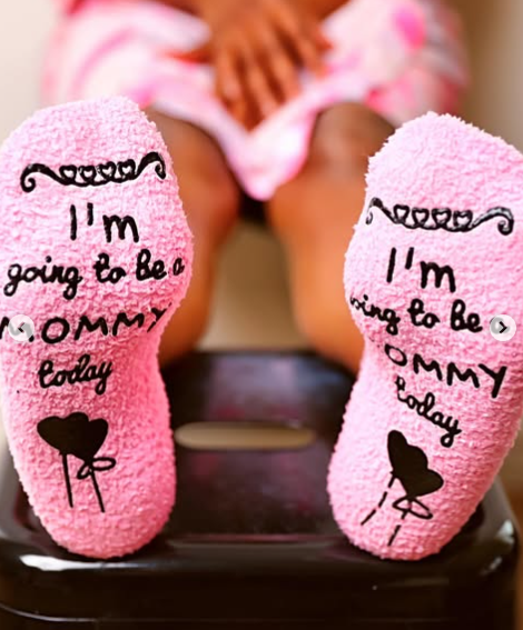 Chika Ike's pink embroided slippers, written "I'm going to be a mommy today,". Picture: Instagram@ChikaIke