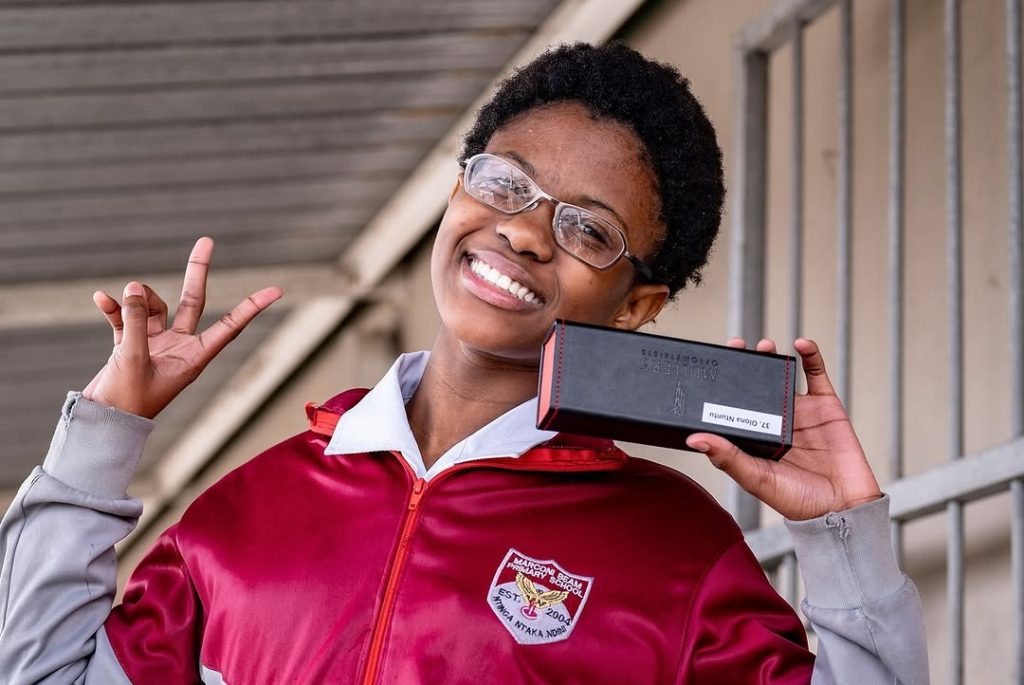 A proud learner from Joe Slovo Secondary School all smiles as she's showing off her brand-new pair of glasses. Picture: Instagram@RachelKolisi