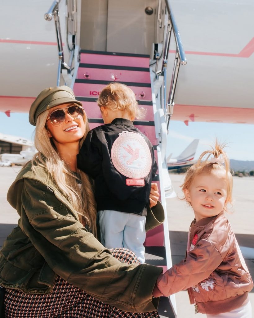 Striking one final pose before takeoff, the trio paused for a sweet photo moment just before boarding their private jet. Picture: Instagram@ParisHilton