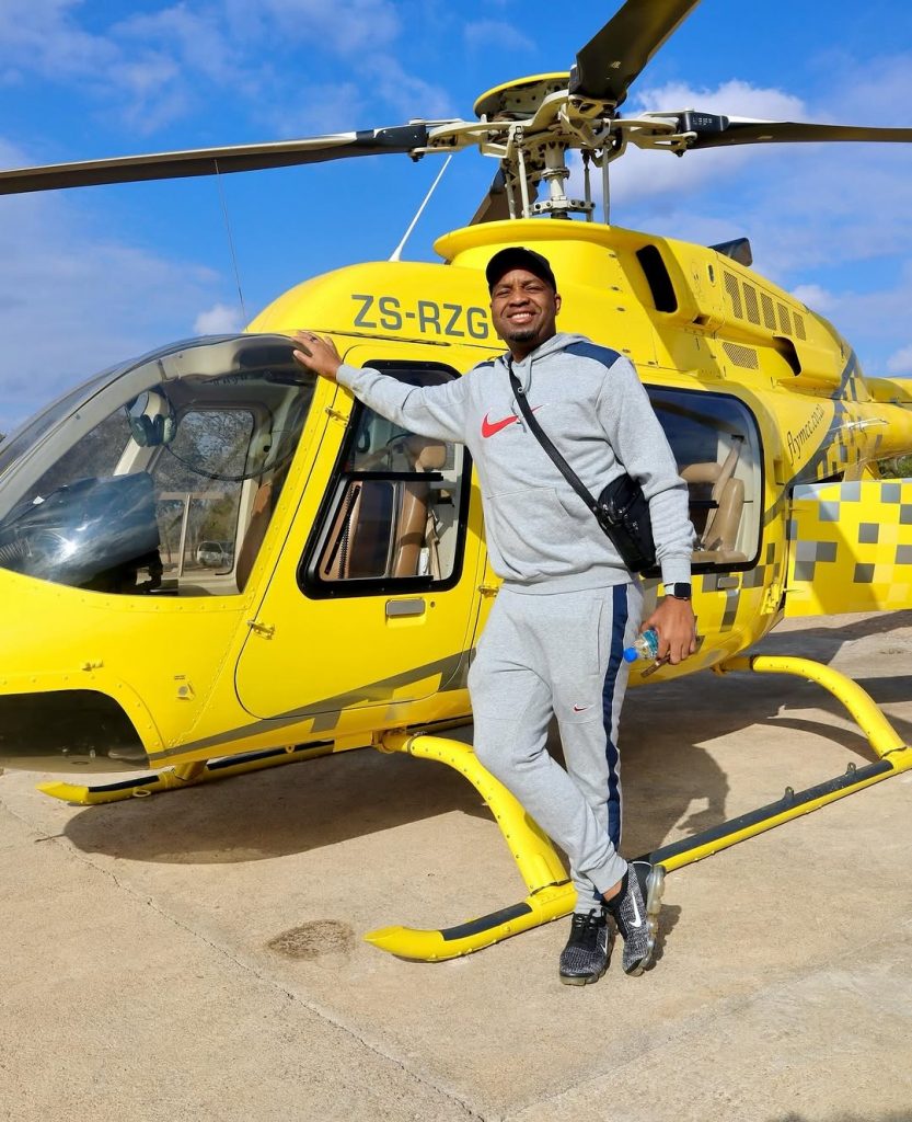 The man of the moment: Legendary goalkeeper Itumeleng Khune, chilled and carefree, posing effortlessly outside the chopper. Picture: Instagram@Itumelengkhune