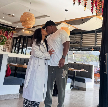 Sealed with a kiss: These two lovebirds share a sweet moment together. Picture: Instagram@BonganiMbonambi