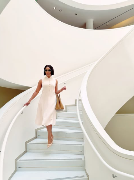 Dressed in all white and walking in her power, Minnie stuns in a gorgeous white dress. Picture: Instagram@MinnieDlamini