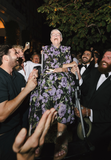 It’s party time! Logan Paul and the crew lift 88-year-old Grandma Lona into the air. Picture: Instagram@LoganPaul