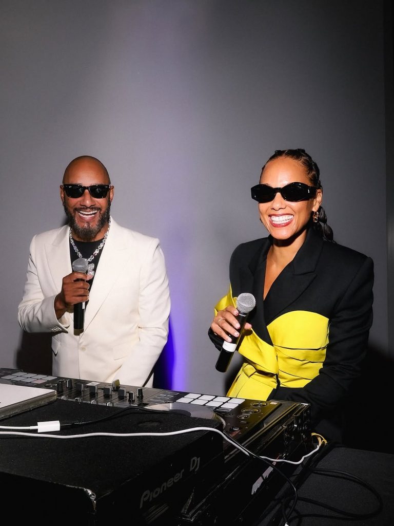 The lovebirds light up in front of the DJ booth, clearly thrilled to be sharing the moment together. Picture: Instagram@AliciaKeys