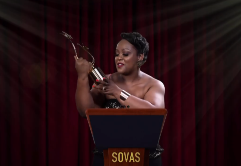 Carol Ofori proudly holding her award for BEST AFRICAN VOICE OVER at the International Society of Voice Arts ceremony. Picture: Instagram@CarolOfori
