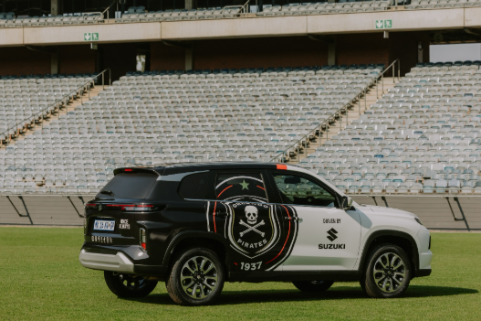 This is a full view of the Suzuki car, featuring the colours, themes, and logo of Orlando Pirates. Picture: Instagram@Transporttorque