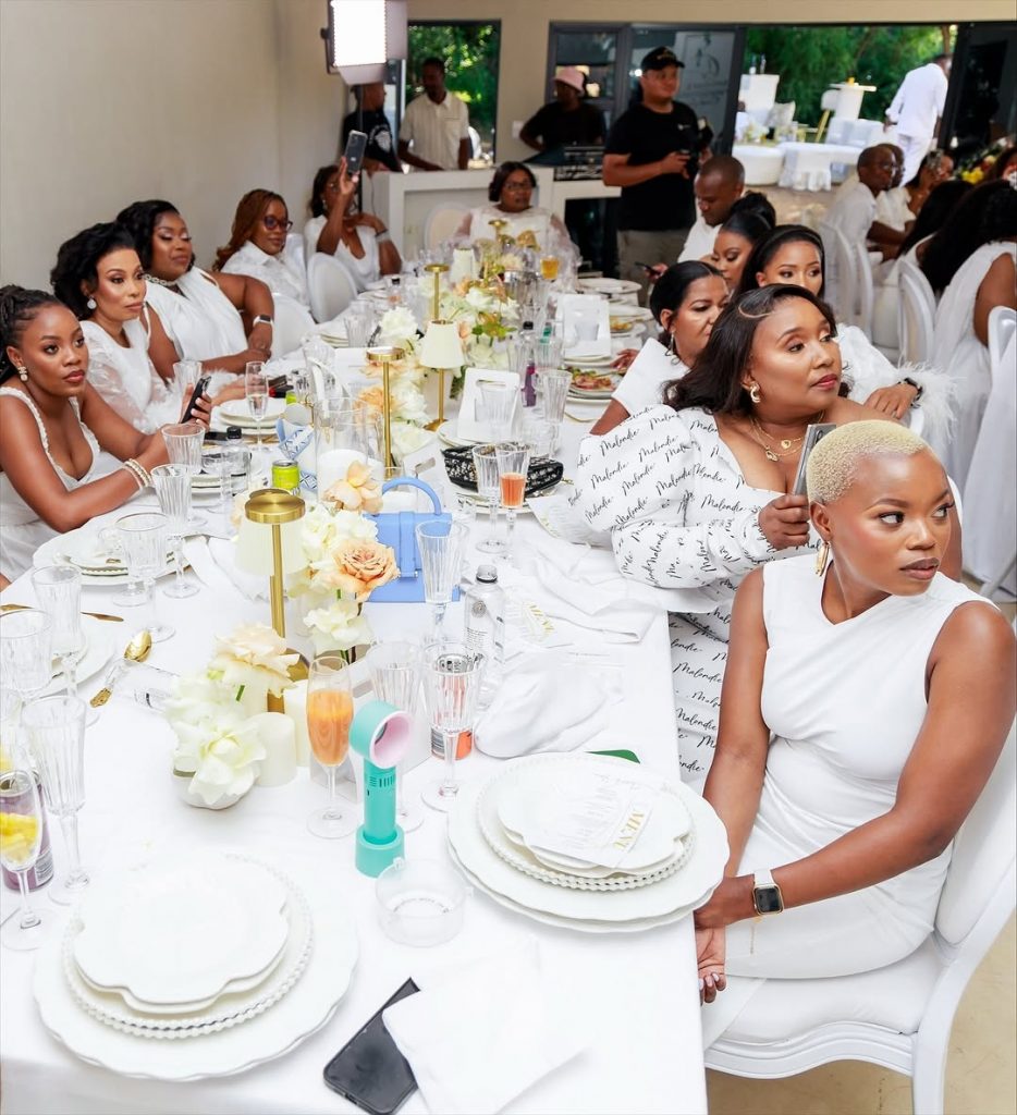 A sea of white: La Conco’s guests seated together in matching white outfits. Picture: Instagram@LaConco