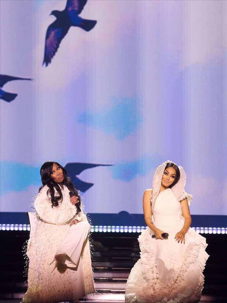 The duo took a seat on stage, rocking their pink outfits as they performed for the crowd. Picture: Instagram@Monicadenise