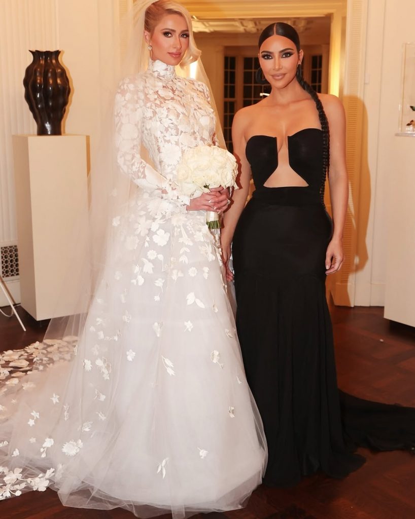 A shot of Paris Hilton in her wedding dress with Kim Kardashian right beside her. Picture: Instagram@ParisHilton