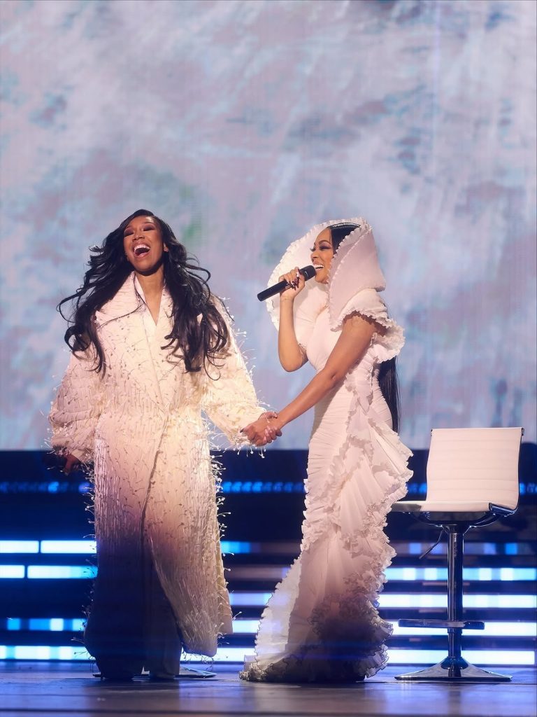 Brandy and Monica shared smiles and joy on stage, holding hands as they sang together. Picture: Instagram@Monicadenise