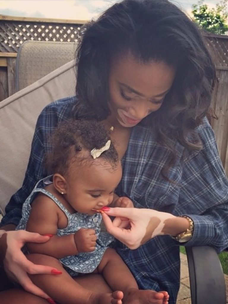 A throwback of Winnie holding baby Sami in her arms. Picture: Instagram@WinnieHarlow
