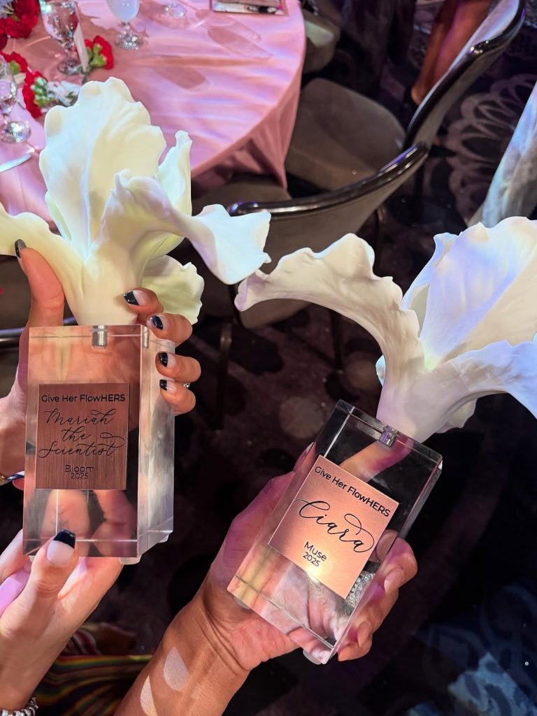 Ciara holding her Muse Award alongside Mariah The Scientist, who received the Bloom Award. Picture: Instagram@Ciara