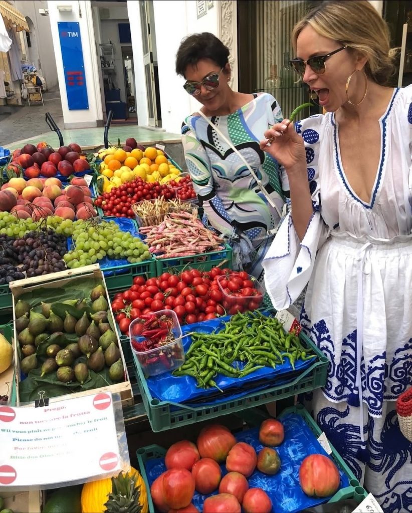 The ladies exploring fresh fruits and vegetables during one of their travel outings. Picture: Instagram@KrisJenner
