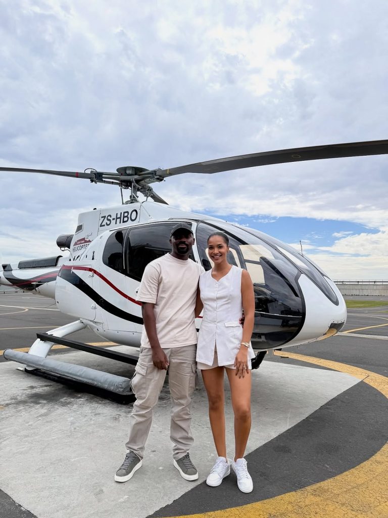 Mzansi’s ultimate #CoupleGoals! Standing outside the chopper, looking stunning and serving major couple vibes. Picture: Instagram@DrMusaMthombeni