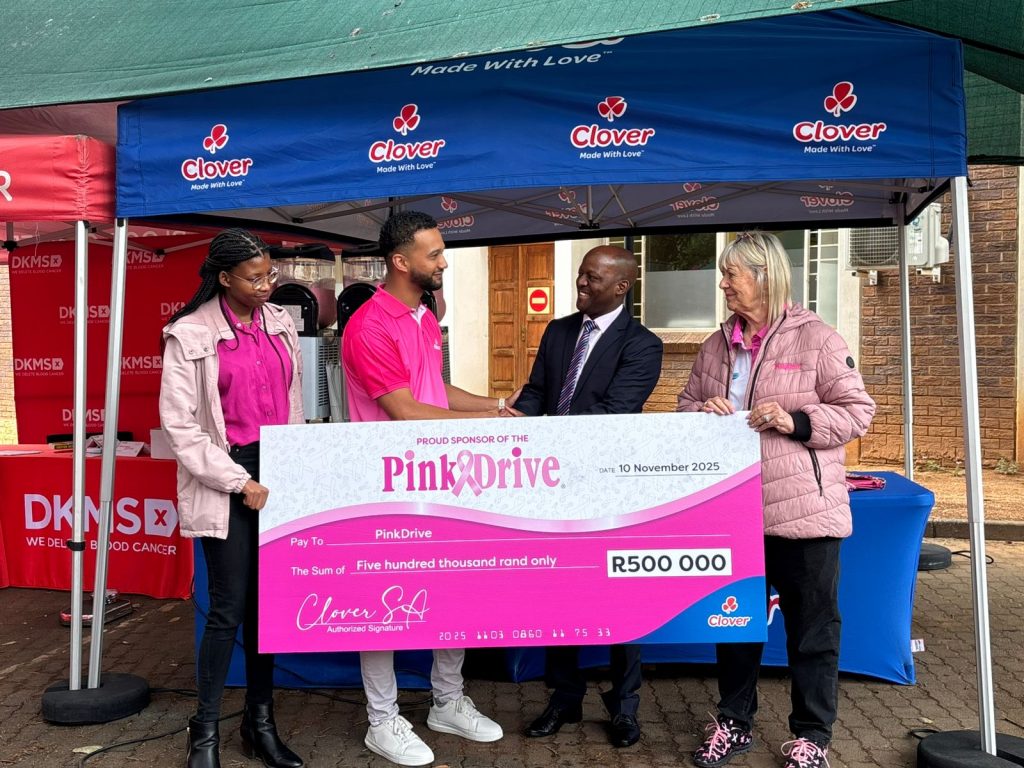 The handover between Clover and PinkDrive. Picture: Supplied