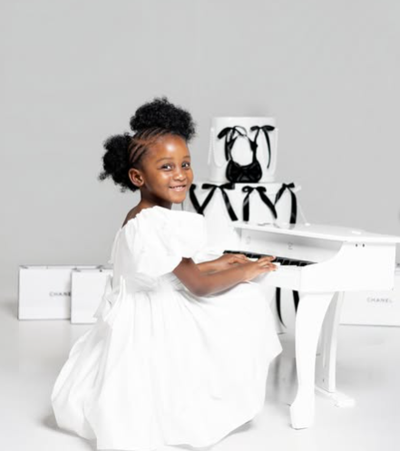 Little birthday queen Paris serving all the cuteness in her chic black-and-white birthday photoshoot. Picture: Instagram@HappySimelane