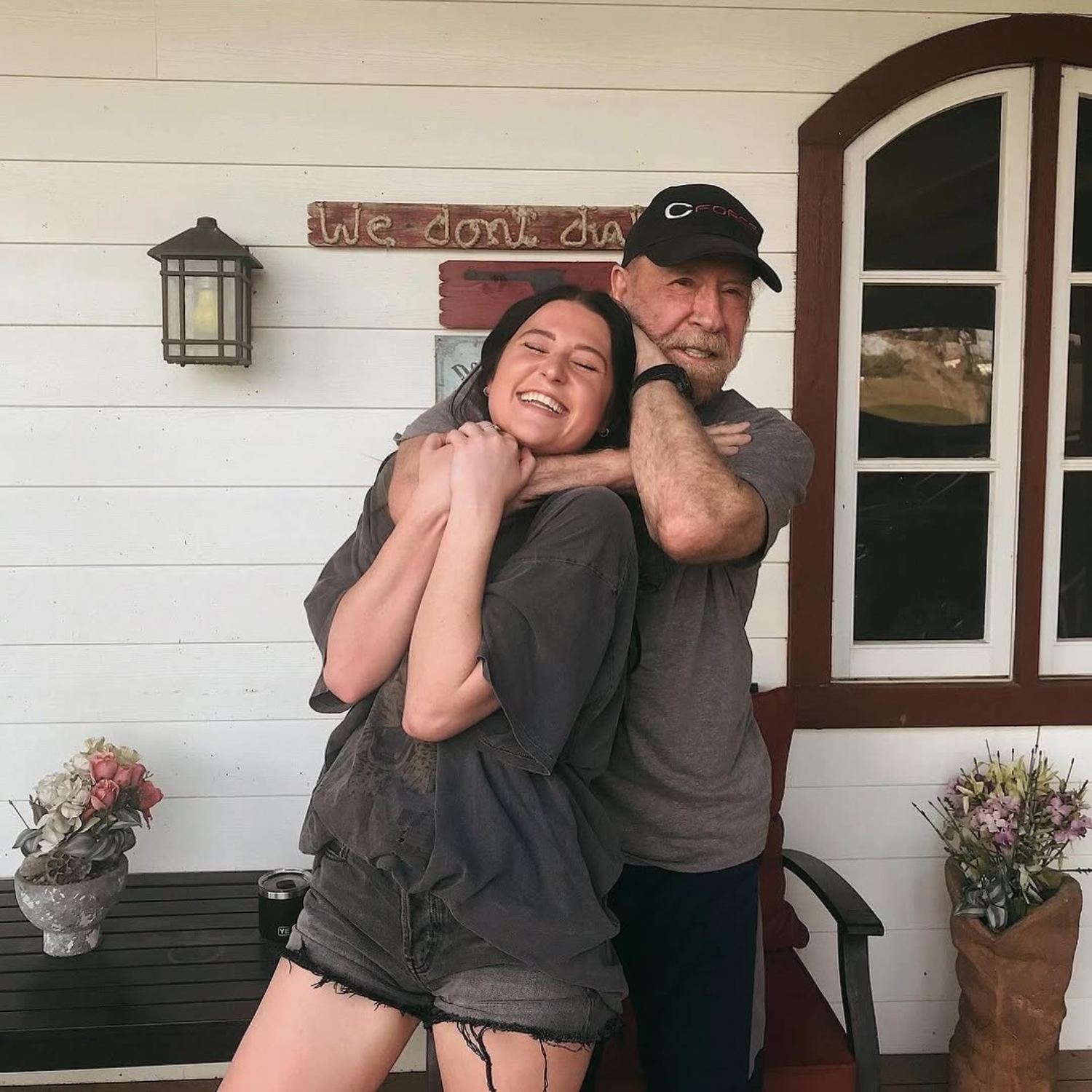 Greta Norris and her late grandfather Chuck Norris