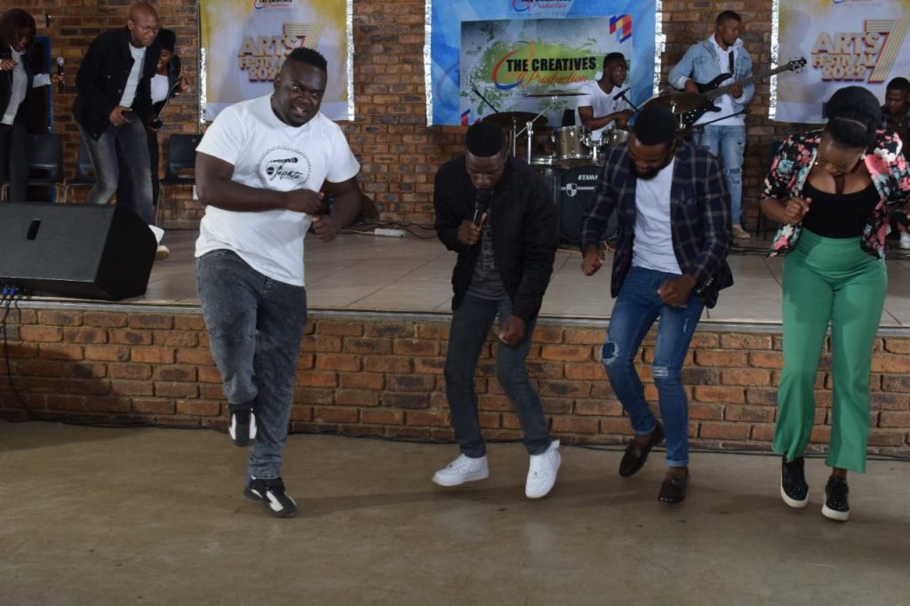 A vibrant moment on stage as performers sang and danced at The Creatives Production’s Arts Festival. Picture: Supplied