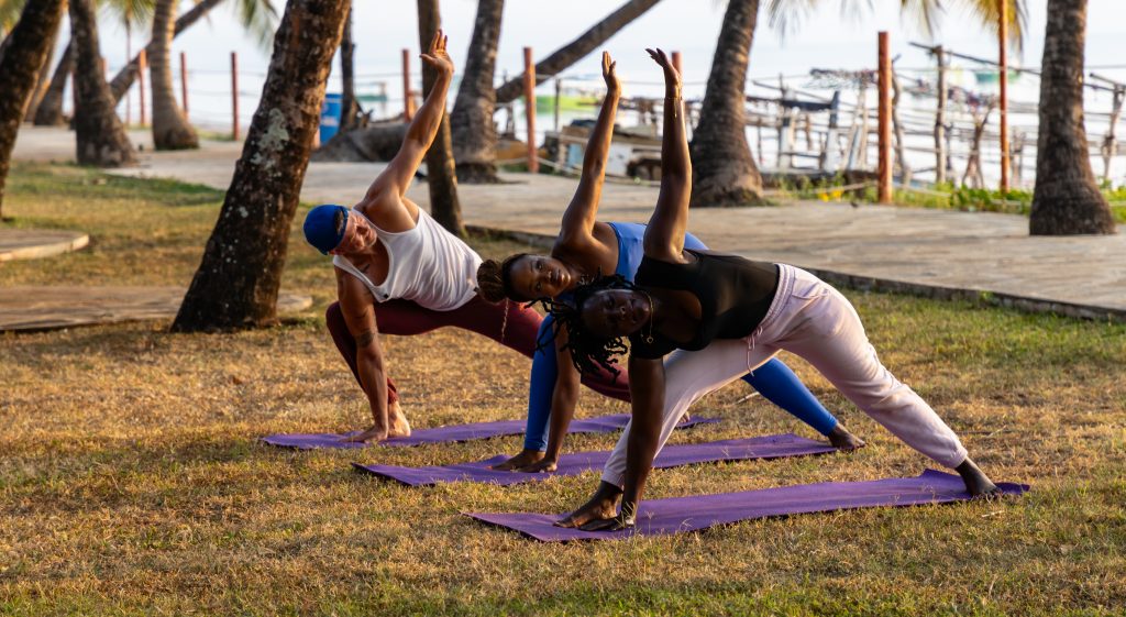 Jonathan and Zanele pictured taking part in a yoga session with an instructor. Picture: Supplied