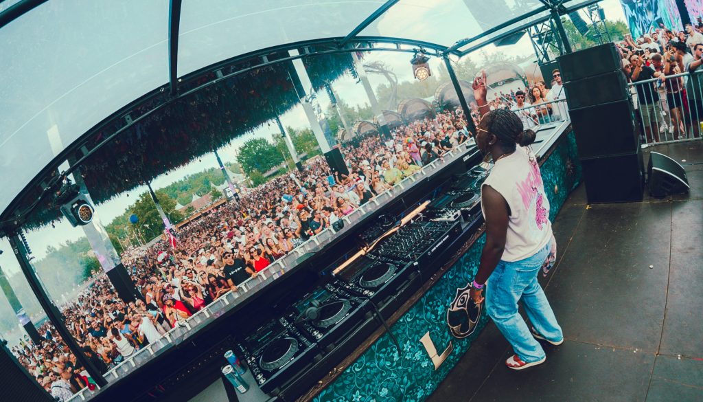 DJ Kitty Amor energises the crowd as they dance to her set during a live event. Picture: Supplied