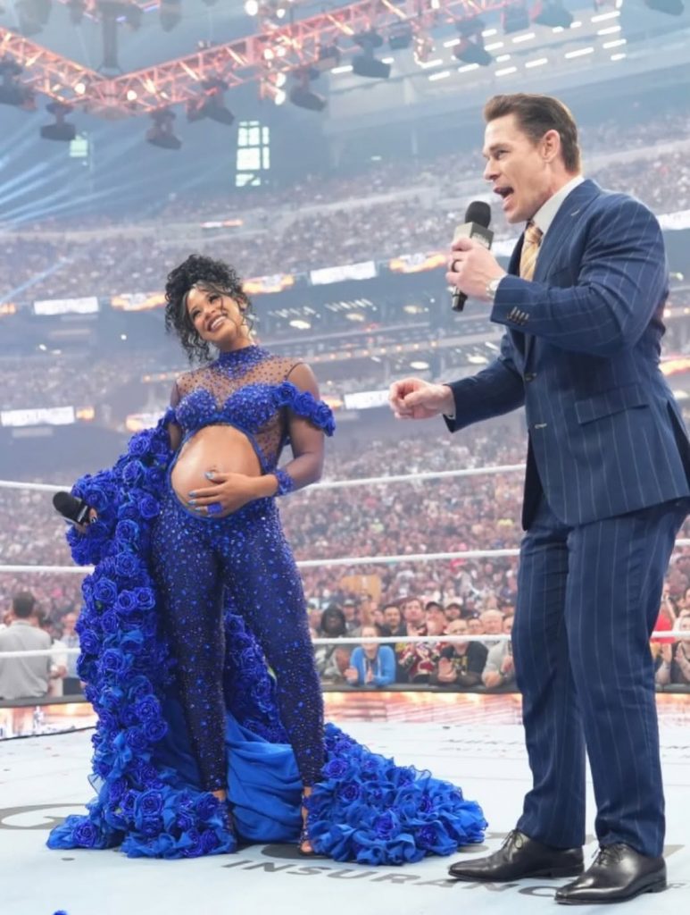 Bianca stunned in blue at WrestleMania 42, standing center ring after debuting her baby bump, while John Cena spoke in disbelief. Picture: Instagram@BiancaBelair