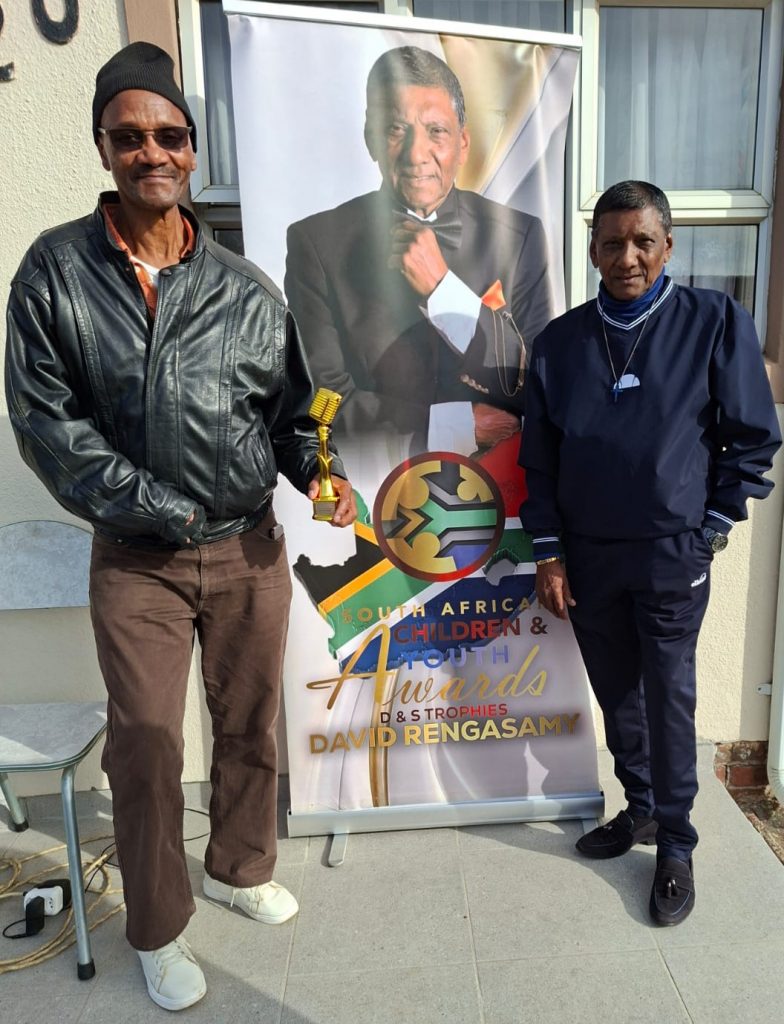 SupaFrika posed with his trophy designed by D&S Trophies, standing beside David Rengasamy. Picture: Author's Own