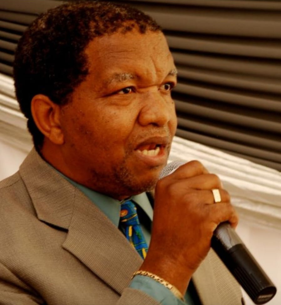 Mr Maxwell holding the microphone as he spoke during the 2016 launch of his biography, "Never Say Never". Picture: Supplied