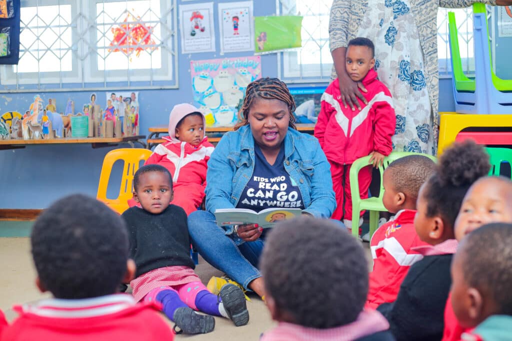 A teacher reading a storybook to her young learners in the classroom. Picture: Nal'ibali