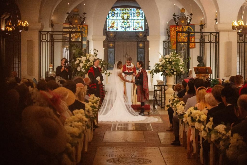 Mel B and her husband Rory McPhee standing at the altar, holding hands during their wedding ceremony. Picture: Instagram@OfficialMelB