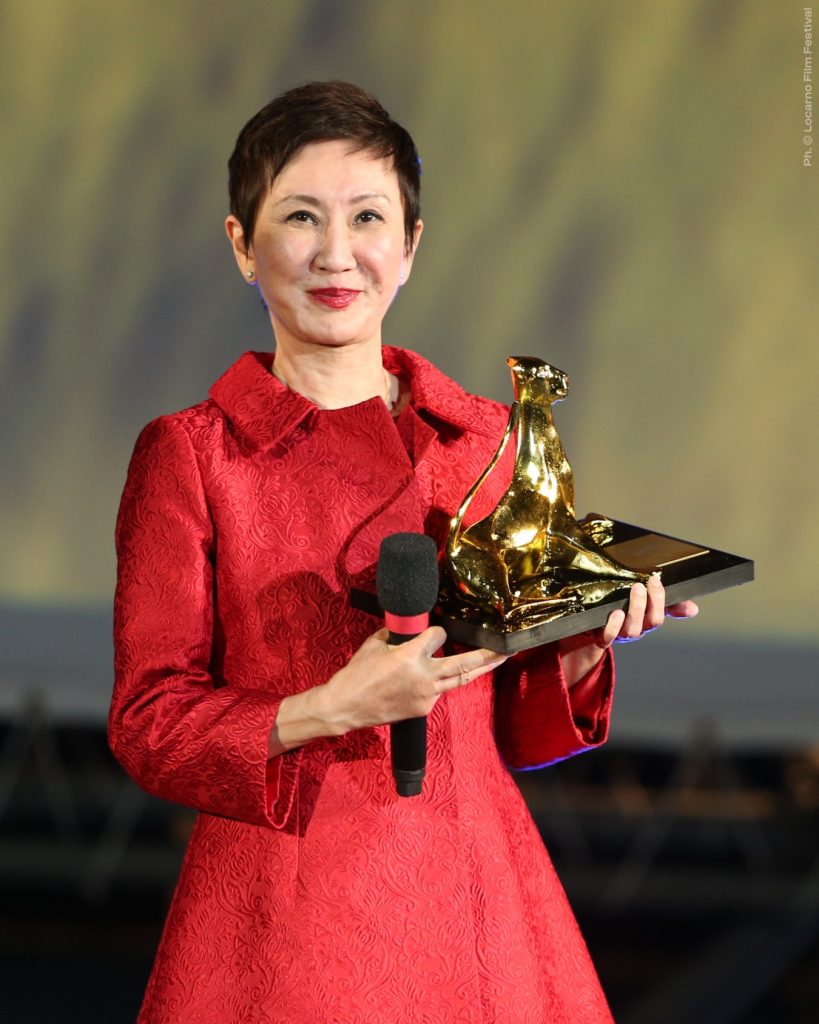 The late Nansun Shi holding her accolade. Picture: Instagram@filmfestlocarno