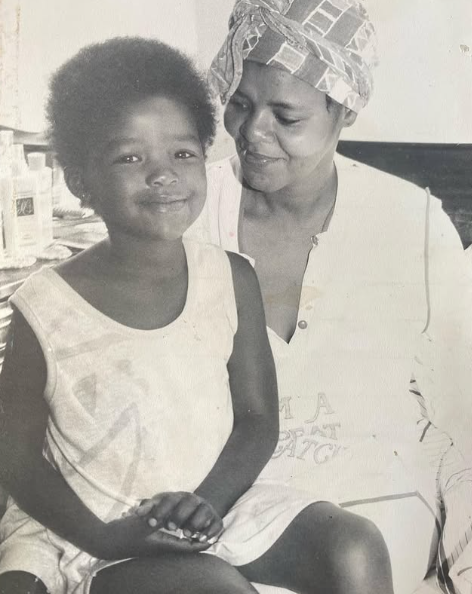 An old black-and-white photo of Nonhle Thema as a young girl with her late mother, Cynthia Shange. Picture: Instagram@NonhleThema